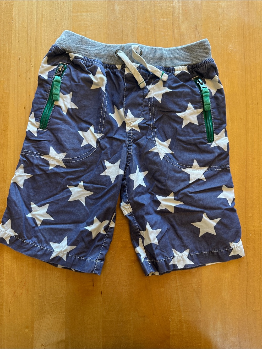Mini Boden Navy Star-Print Shorts with Green Zip Accents